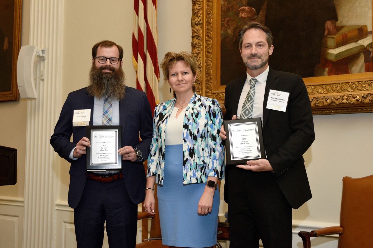 Drs. Andre Bachmann and Caleb Bupp accepting the New York Intellectual Property Law Association's Inventor of the Year Award